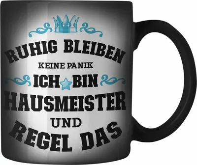 Produktbild von Trendation - Hausmeister Farbwechsel Zauber-Tasse Lustiges Geschenke Lustig Spruch Haustechniker Geschenkidee Sprüche Keine Panik (Schwarz)