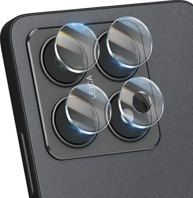 A close-up view of a smartphone's camera lenses with protective covers.