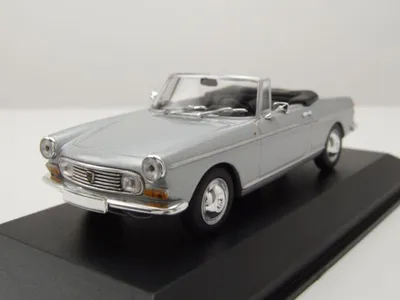 Produktbild von Maxichamps 940112930 Peugeot 404 Cabrio 1962 silber 1:43