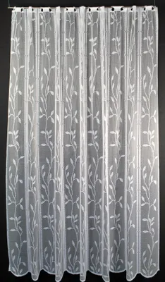A white lace curtain with a leaf vine pattern hanging against a black background.