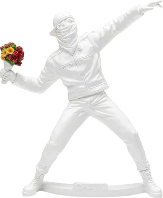 Image de Figurine décorative avec une fleur, idéale pour un intérieur moderne