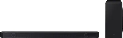 A black soundbar and subwoofer are displayed against a white background.