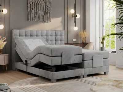 A bedroom scene with an adjustable bed.
