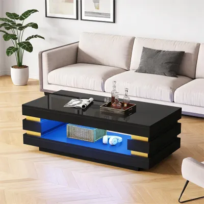 Produktbild von MODFU Couchtisch mit LED Beleuchtung Hohlraum-Design zur Aufbewahrung geeignet Beistelltisch Kaffeetisch mit Offener Stauraum für Wohnzimmer geeignet Schwarz