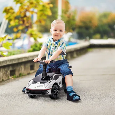 Produktbild von Rutschauto Lamborghini-Lizenz, Rutscher Kinderfahrzeug mit Soundeffekten, Kunststoff Metall, Weiß/Schwarz | 67x28x38 cm | Kippschutz | Staufach
