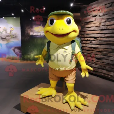 Produktbild von Maskottchen REDBROKOLY eines gelben Frosches bekleidet mit Cargo-Shorts und Fußpolstern