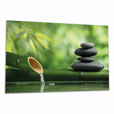 Produktbild von Wallario Herdabdeckplatte aus Glas, Größe 80 x 52 cm 1-teilig, Motiv Steinstapel und Bambus auf dem Wasser