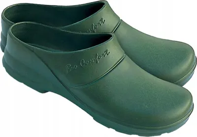 A pair of green clogs on a white background.