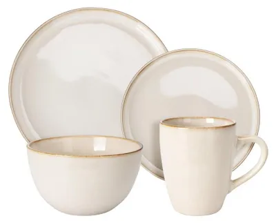 A set of beige stoneware dishes including plates, a bowl, and a mug, arranged on a white background.