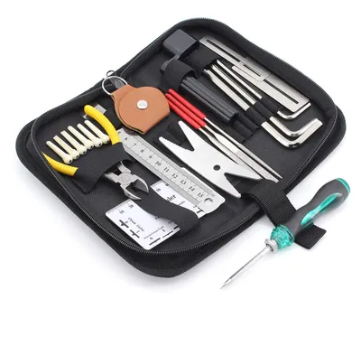 Image de Kit de réparation et d'entretien pour guitare (26 pièces) - Inclut des outils
