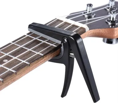 Immagine prodotto di CHPN – Capotasto per ukulele – Capotasto nero – Capotasto per chitarra – Accessori per chitarra – Capotasto per ukulele – Morsetto per chitarra – Chitarrista