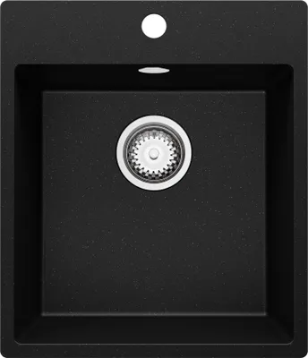 A top-down view of a black granite kitchen sink with a silver drain.