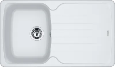 A top-down view of a white kitchen sink.