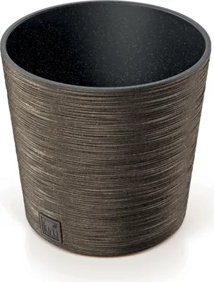 A close-up studio shot of a round, textured planter pot.