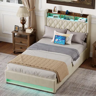 A bedroom scene featuring a bed with a tufted headboard, bedside table, lamp, and decorative items.