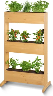 A three-tiered wooden planter filled with various plants.