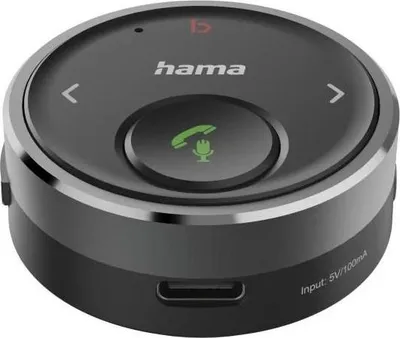 A close-up studio shot of a black and silver Bluetooth transmitter/receiver device.