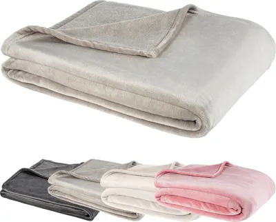 A folded blanket is shown in the top half of the image, and four folded blankets in different colors are shown in the bottom half.