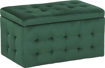 A green velvet ottoman with tufted upholstery.