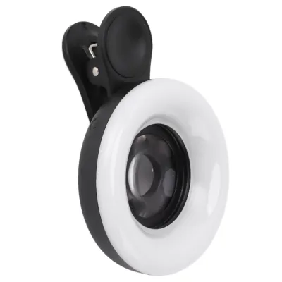 A close-up studio shot of a clip-on ring light for a phone camera.