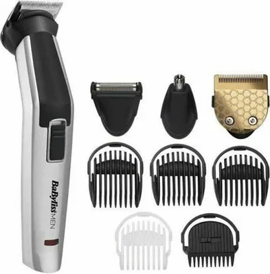 A collection of grooming tools and attachments laid out on a white background.