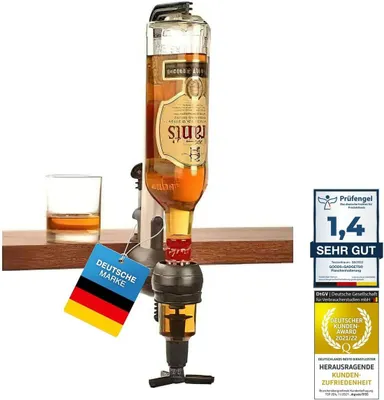 A bottle of liquor with a dispenser attached, placed on a shelf next to a glass.
