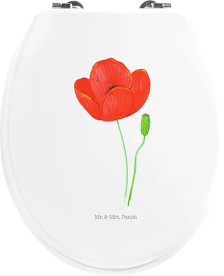 A toilet seat with a painted red poppy flower and a green bud.