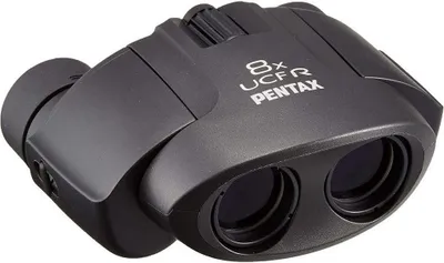A black Pentax 8x21 UCF R binoculars.