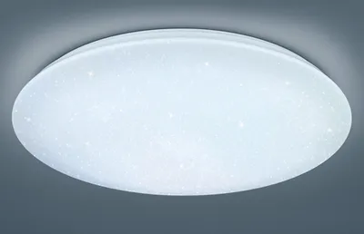 A close-up, studio shot of a round, white LED ceiling light with a speckled, starry pattern.