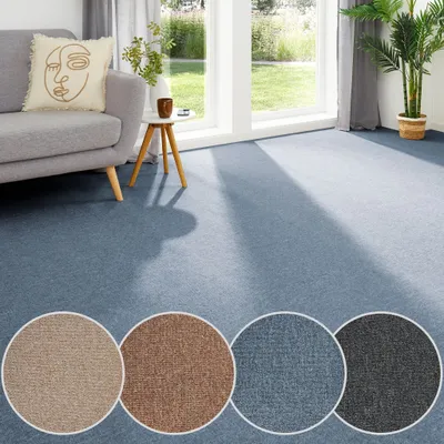 Teppichboden als Auslegware in blau mit Farbmustern in beige, cognac, anthrazit. 
