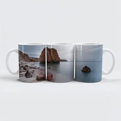 Produktbild von raxxa Premium-Tasse "Strand mit Steinblöcken"