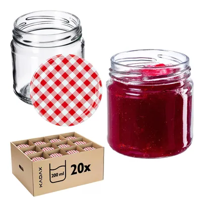 A collection of glass jars with red and white checkered lids, and a box of the same jars.