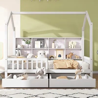 A children's bedroom with a white house-shaped bed, complete with a bookshelf and storage drawers, decorated with stuffed animals and toys.