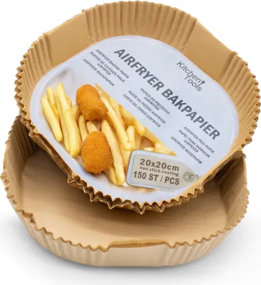 A product shot of air fryer baking paper liners with french fries and chicken nuggets inside one liner, with another liner shown below.