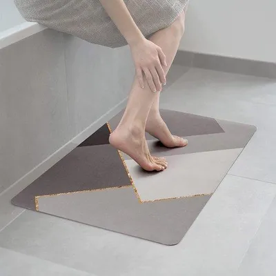 Immagine prodotto di Tappetino da bagno Unyqoos® realizzato in diatomee – antiscivolo e ultra-assorbente (fango di diatomee), color oro, ideale per doccia e bagno