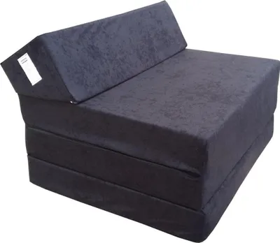 A dark gray foldable mattress/chair in a folded position.