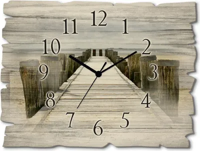 A clock with a wooden pier leading into a misty body of water.