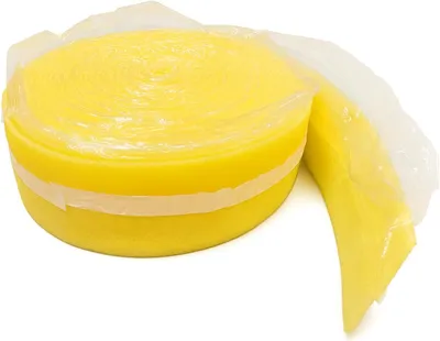 A roll of yellow insulation material, likely for underfloor heating, wrapped in clear plastic.