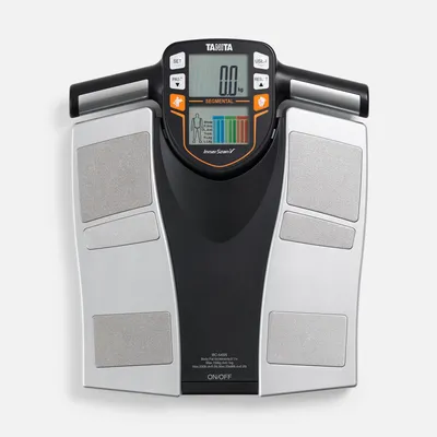 A top-down view of a TANITA BC-545N Segmental Body Composition Scale against a white background.