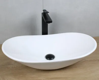 Produktbild von Keramik Waschbecken oval 640x365x130 weiß ohne Überlauf Aufsatzwaschbecken mit Pop-Up Ablauf schwarz-matt