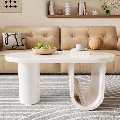 Immagine prodotto di Tavolino ovale moderno, dal design minimalista in bianco, con gambe robuste a forma di U e spazio contenitivo