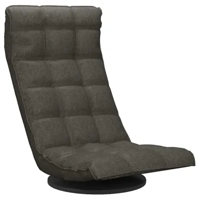 A dark gray fabric floor chair with a swivel base, shown from a side-angle against a white background.