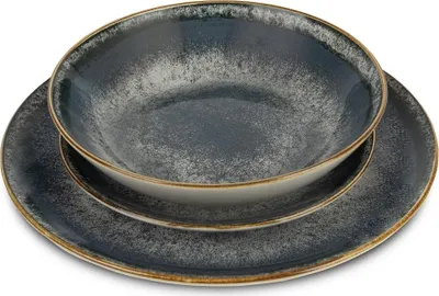 A stack of grey and blue ceramic plates and bowls.