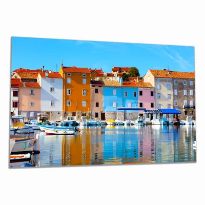 Produktbild von Wallario Herdabdeckplatte aus Glas, Größe 90 x 52 cm 1-teilig, Motiv Bunte Häuser am Hafen