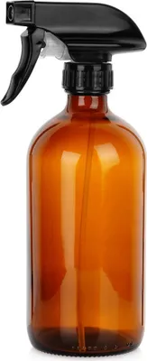 A close-up studio shot of a glass spray bottle.