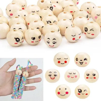 Produktbild von Famanu Holzperlen Emoji 20 mm 140 Stück – Lachende Gesichter in 7 Designs