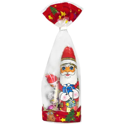 A Christmas-themed chocolate gift bag featuring a chocolate Santa figure and smaller chocolates.