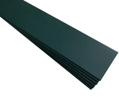 A stack of dark green decorative foam panels, likely for wall decoration, laid out diagonally on a white background.