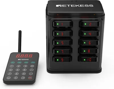 A black wireless paging system with a base station and a remote transmitter, displayed on a white background.