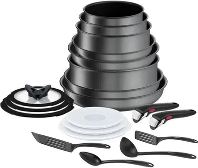 A set of cookware and utensils is displayed against a white background.